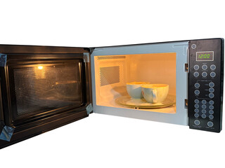 Microwave Oven with Overflowing Cups of Food isolated on transparent white background, png. 