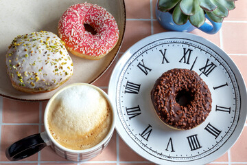Coffee and donuts. Food background.