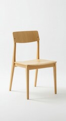 Fototapeta premium Simple wooden dining chair stands isolated against a bright white background