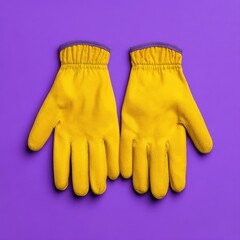 Bright yellow rubber gloves on a vibrant purple background, ideal for cleaning or gardening tasks.