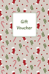 Gift Voucher - Schriftzug in englischer Sprache - Geschenkgutschein. Gutscheinkarte mit Weihnachtsstrümpfen, Zuckerstangen, Zweigen und roten Beeren.
