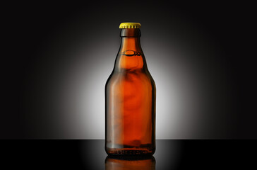 a small glass bottle of beer