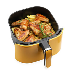 Grilled chicken wings and french fries with rosemary in air fryer basket isolated on white