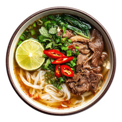 A delicious bowl of traditional beef noodle soup topped with fresh herbs zesty lime and spicy red chili peppers