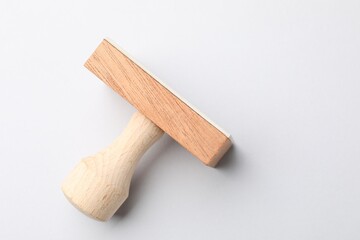 One wooden stamp on white background, top view. Space for text