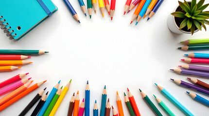 Colorful pencils frame blank space for creative design and ideas