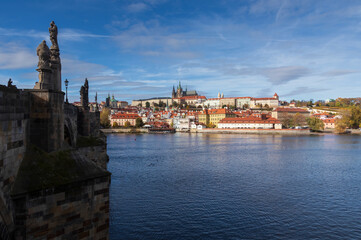 Fototapeta premium Panoramic view to city Prague with river Vltava, Charles bridge and castle
