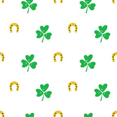 Green gold Saint Patricks Day shamrocks and horseshoes seamless vector pattern. Irish lucky charm motifs. Geometric St. Patricks day celebration symbols on white background. Ireland themed backdrop.