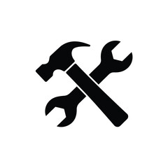 Simple black icon of a hammer and wrench crossed