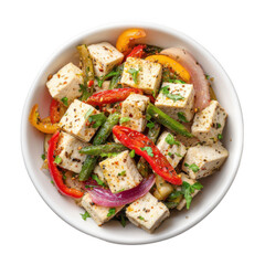 A white bowl holds a delicious mix of seasoned cheese cubes roasted peppers onions and green beans on a black background