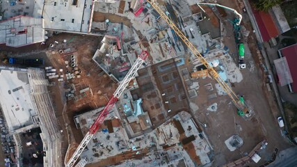 Drone flyover image of an active construction site in Germany, showing urban development, modern housing needs, and the construction sector’s economic role in both Germany and the European Union. - Powered by Adobe
