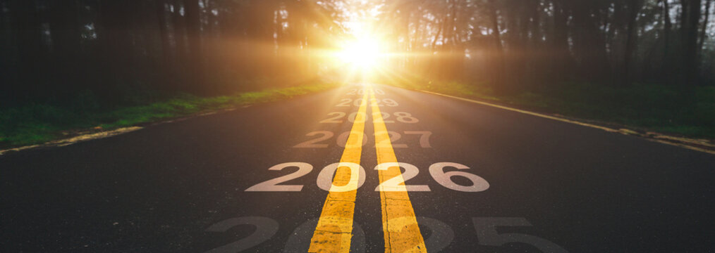 Year 2025 to 2026 written on the road. Business planning concept and new year beginning success idea