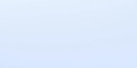 Fototapeta premium Close-up of a sheet of blue-lined paper, showing the texture and lines, simple, writing