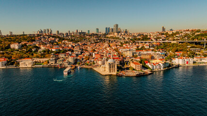 Mecidiye Cami - Ortaköy Mosque by the Bosphorus in istanbul, Turkey. A major Ottoman Mosque Buyuk Mecidiye Camii and abandoned Esma Sultan Mansion. One of the famous symbols of Besiktas Region. Aerial