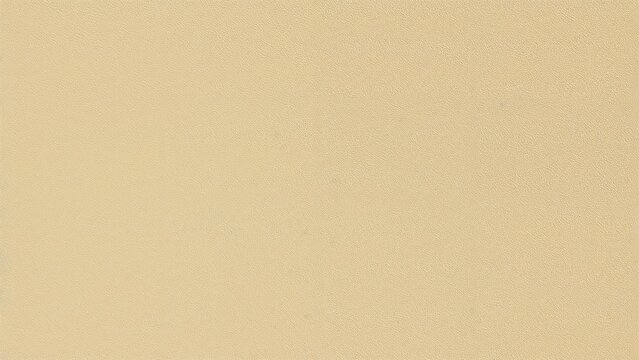 A close-up of a beige or light tan surface with a smooth, consistent texture.