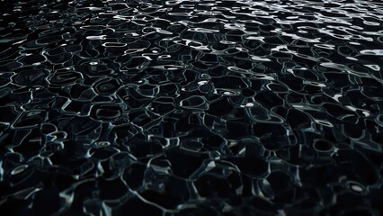 Obraz premium A close-up of water surface with ripples and reflections.