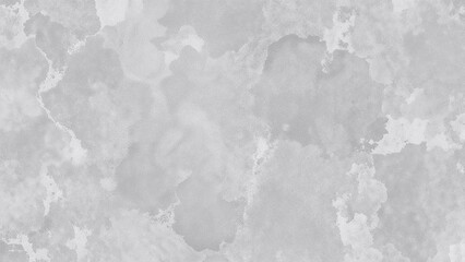 Fototapeta premium Aerial view of a textured, gray surface with irregular patterns and patches.