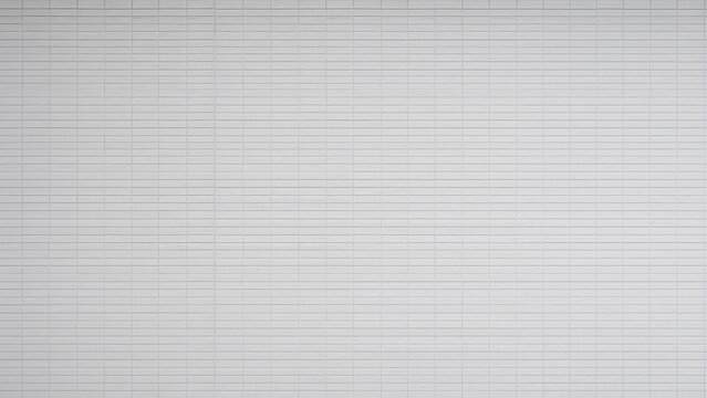 A blank sheet of graph paper with small grid lines.