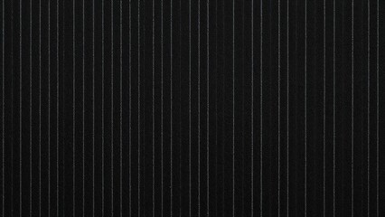 Obraz premium Close-up of a black surface with thin, vertical white lines.