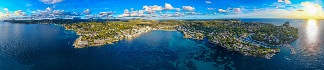 Aerial View of Beachfront Hotels, Luxury Villas, and Condominiums lining Santa Ponça Bay, Mallorca