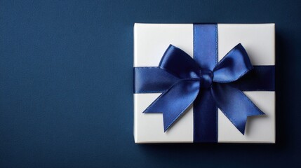 white gift box blue ribbon