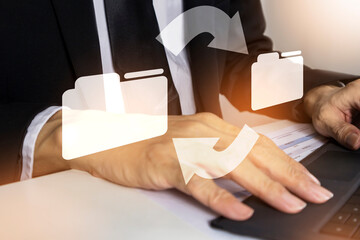 Fototapeta premium Businessman look up documents and sort items for efficiency.,Systematic search document information concept.,defragmentation