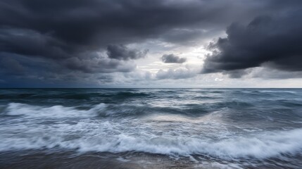Landscape photograph of a stormy sky over the ocean. the sky is filled with dark, ominous clouds that are covering most of the sky.