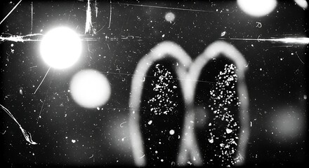 Abstract black and white film grain with light leak and dust