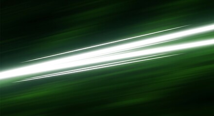 Abstract green background with blurred light streaks creating dynamic motion