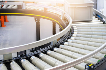 The machinery system for delivering goods in the material warehouse with a sliding mechanism, in a focus view on the sliding equipment.