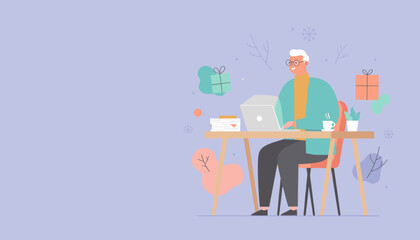 Senior man working or online shopping on a laptop during the cozy winter holiday season