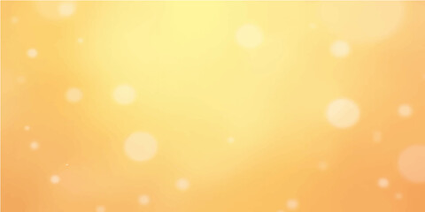 Bright, abstract golden light background with yellow and orange bokeh for a shiny Christmas or summer holiday design © Fahid