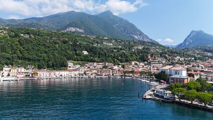 Fototapeta premium Toscolano Maderno town on Lake Garda Italy drone,aerial blue sky