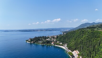 Toscolano Maderno  town on  Lake Garda Italy drone,aerial  clear blue sky