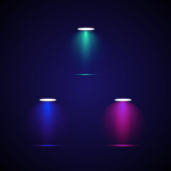 Three colorful spotlights illuminating a dark stage.lighting.Spotlight sources, concert light effect, flashlight set on gradient and dark blue background
