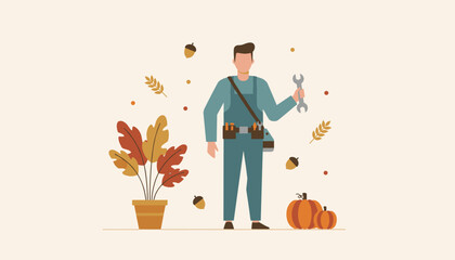 Maintenance worker with wrench and tool belt standing amidst autumn plants and pumpkins