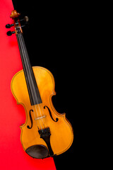 Violin on a red and black background