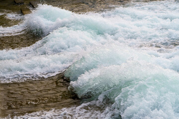 Dam spillway close up flowing water day