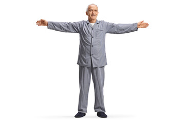 Elderly man in pajamas exercising