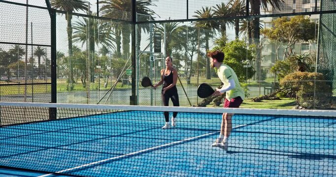 Padel, court and people with skills, high five or training for challenge with energy, active or win. Outdoor, tennis player or team with equipment for tournament, celebration and fitness for sport