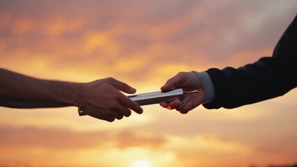 Relay race. Passing the baton. - Powered by Adobe