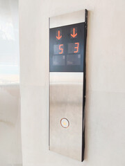 Modern Elevator Call Button Panel Showing Digital Floor Numbers and Directional Arrows