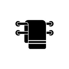 Clean towel hangs on a metal rack in a bathroom, ready for use after a shower, conveying a sense of hygiene and comfort.