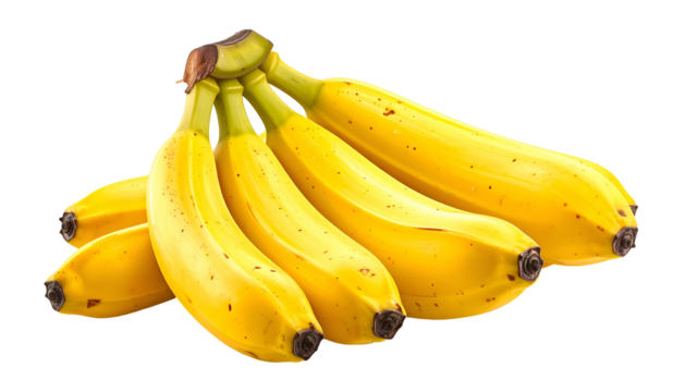 A bunch of ripe, yellow fruit, with brown spots, against a black background