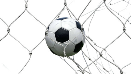 A soccer ball nestled in a net, against a black background. Close up and focused