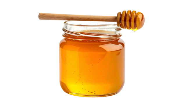 A clear glass jar filled with golden honey, a wooden dipper resting across the top
