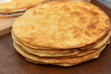 Woman Assembling Homemade Layered Puff Pastry Cake