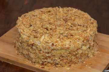 Homemade Layered Puff Pastry Cake with Berries on Wooden Table