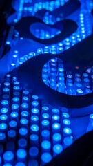 A closeup of luminous blue rounded objects with bright lights casting an electric glow
