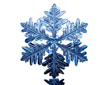 Intricate, six-pointed, crystalline structure with delicate icy formations. Black background